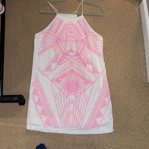 White dress with neon pink detailing